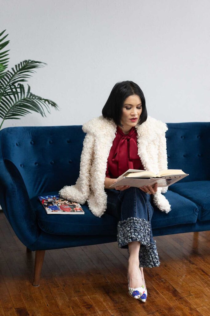 Professional woman confidently wearing a polished outfit after a strategic wardrobe edit and closet refinement session
